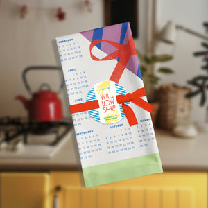 Folded 2026 Vintage Bouquet Calendar Tea Towel tied with ribbon, ready for gifting