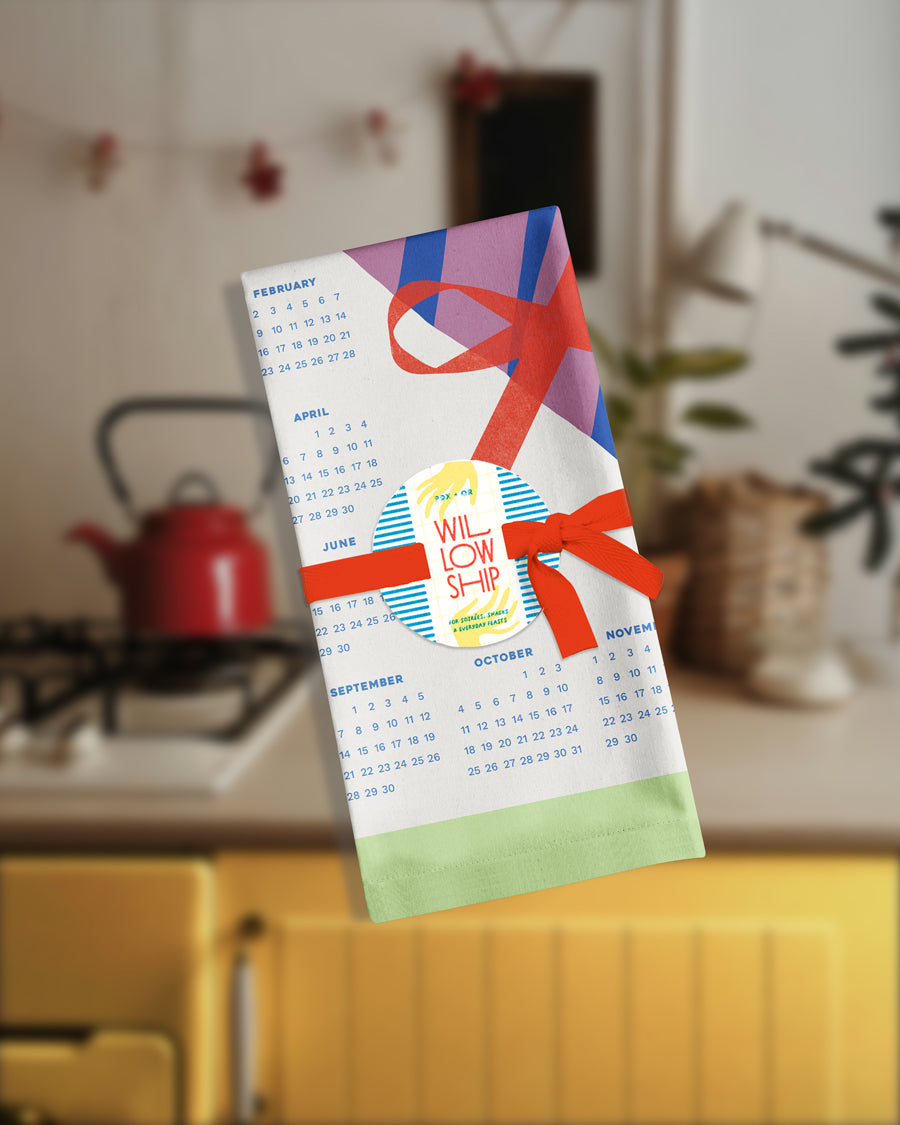 Folded 2026 Vintage Bouquet Calendar Tea Towel tied with ribbon, ready for gifting